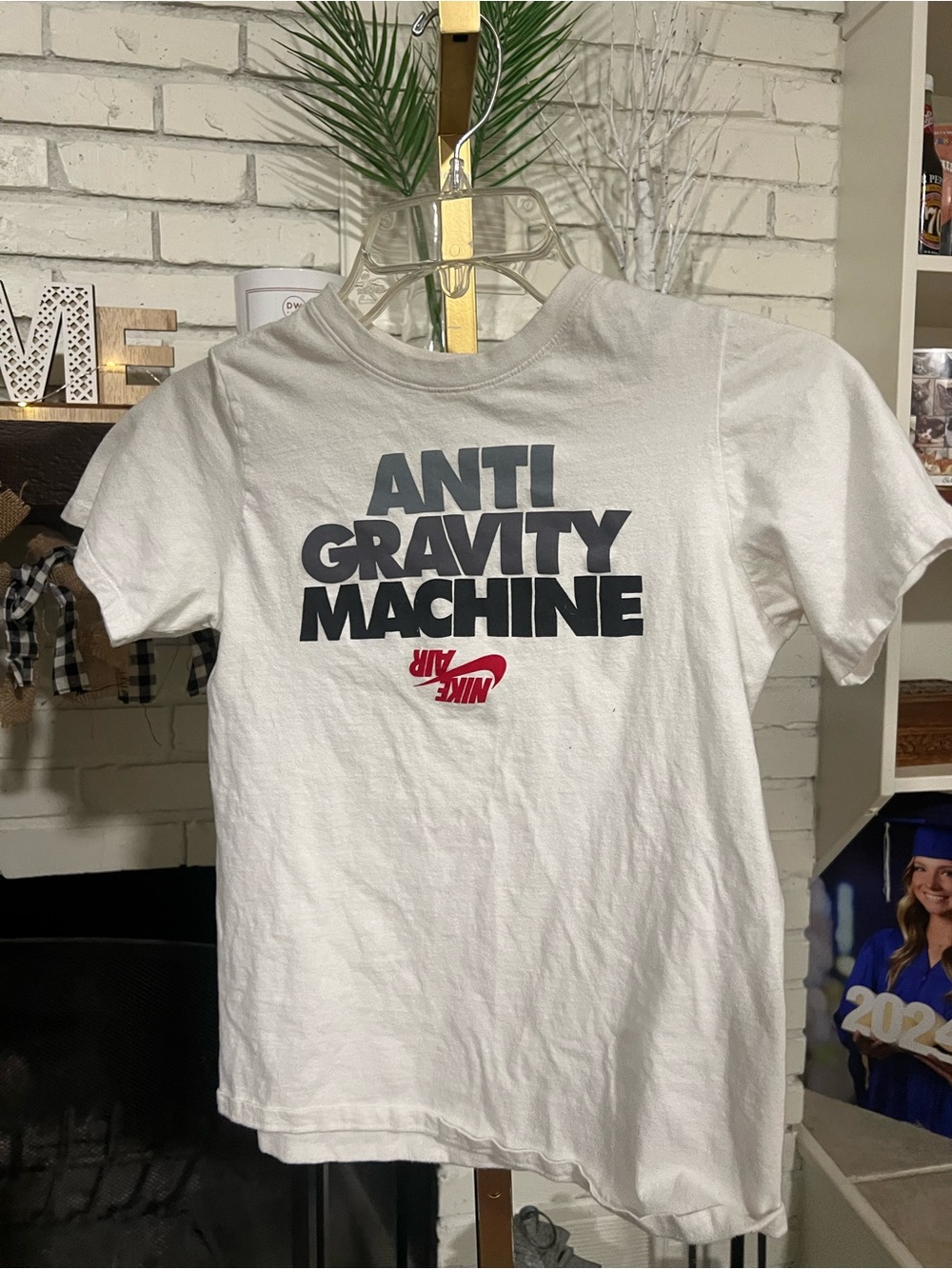 Nike White Short-Sleeve Tee with Black Text and Red Logo